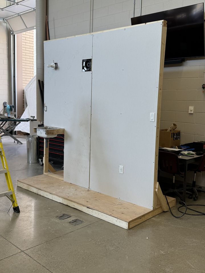 Drywall: students working on drywall