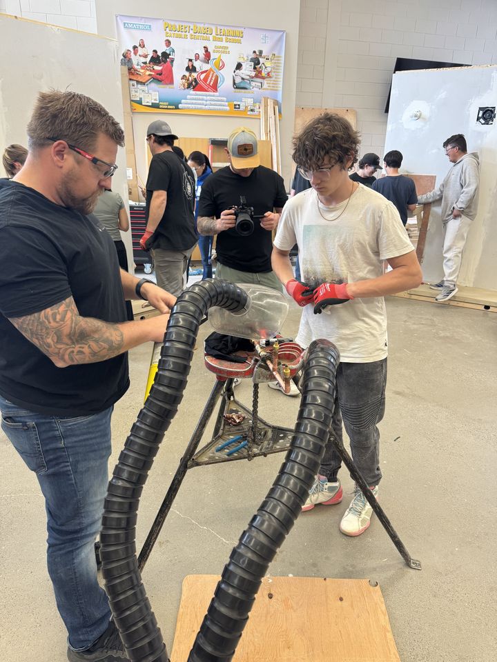 Plumbing: students working on plumbing